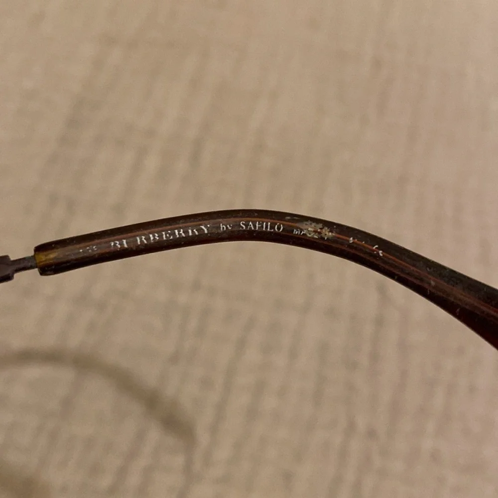 Burberry Elegant Brown Oval Eye Glasses Frame .